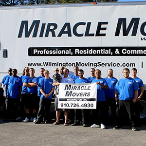 An image of Miracle Movers team with Miracle Movers AD